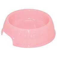 Pink plastic bowl for dog